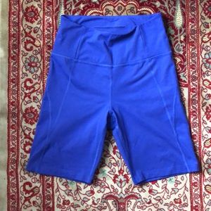 Girlfriend Collective bike shorts in Pansy 💜